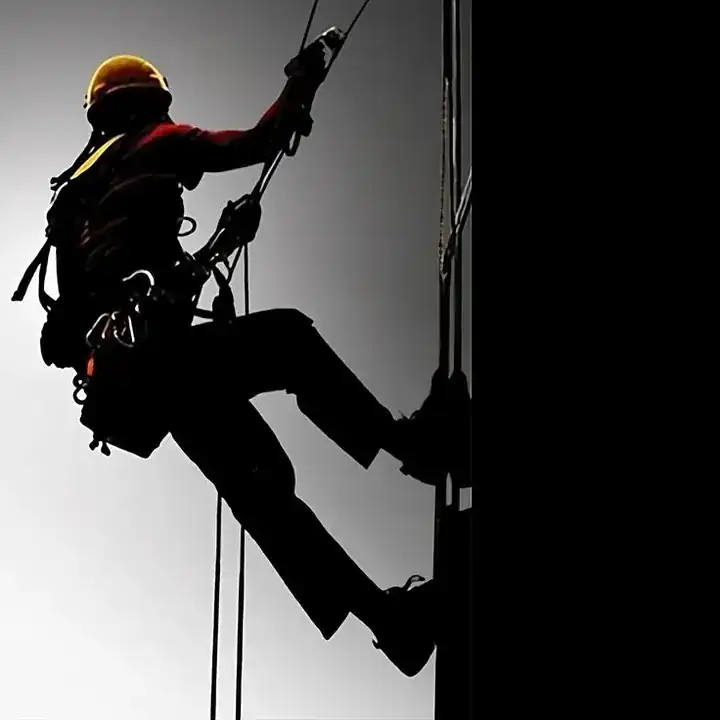 Industrial worker in safety harness, workwear and uniform manufacturing in Bangladesh, DRESSOURCE