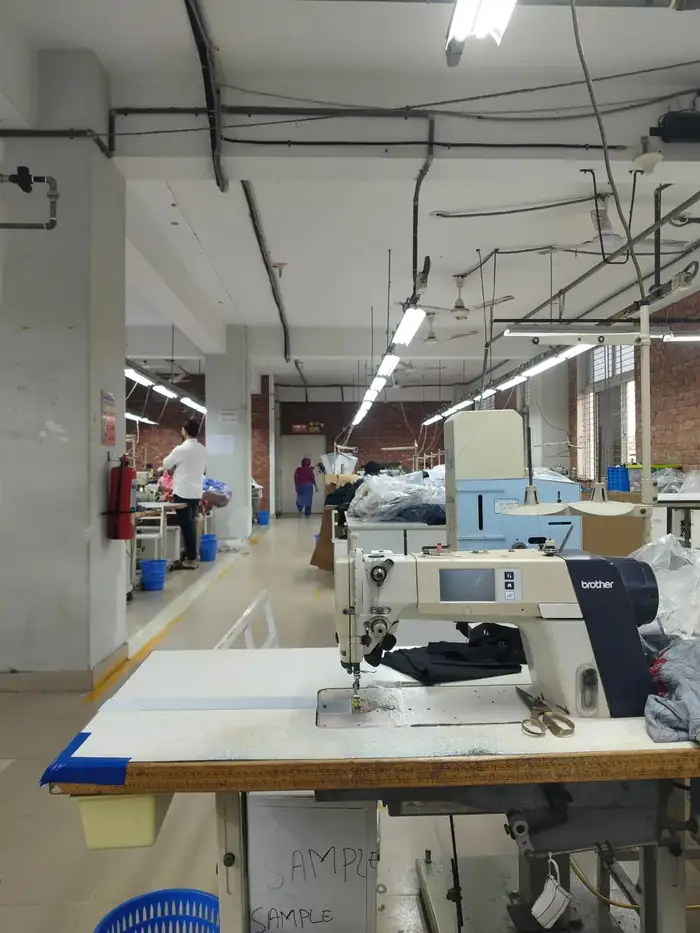 Sample room sewing station for garment sampling and development, factory in Dhaka, Bangladesh, DRESSOURCE