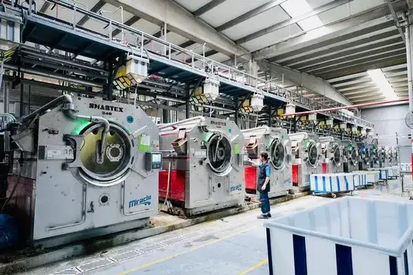 Water-efficient industrial denim washing machines at a DRESSOURCE partner factory, Bangladesh